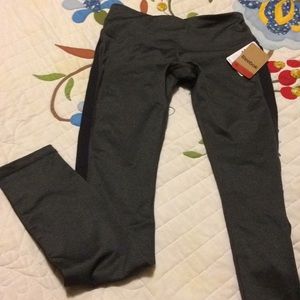 Reebok stretch leggings with zip pocket